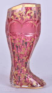 A RARE 19TH BOHEMIAN RUBY AND GILDED GLASS BOOT engraved with monuments. 17.5 cm high.: A RARE 19TH BOHEMIAN RUBY AND GILDED GLASS BOOT engraved with monuments. 17.5 cm high.
