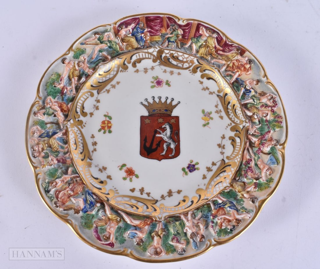 AN UNUSUAL ANTIQUE ITALIAN NAPLES PORCELAIN ARMORIAL PLATE. 18 cm wide.: AN UNUSUAL ANTIQUE ITALIAN NAPLES PORCELAIN ARMORIAL PLATE. 18 cm wide.