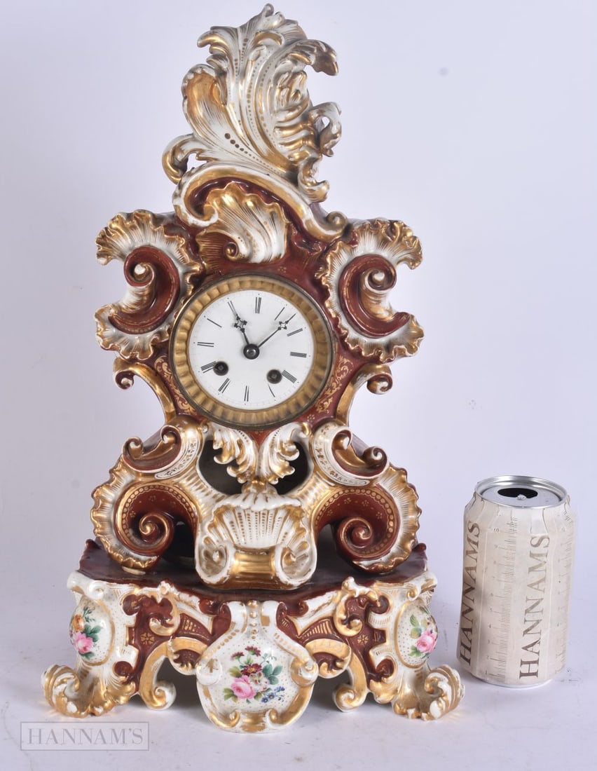 A LARGE 19TH CENTURY FRENCH JACOB PETIT PORCELAIN ROCOCO CLOCK painted with flowers. 40 cm x 18 cm.: A LARGE 19TH CENTURY FRENCH JACOB PETIT PORCELAIN ROCOCO CLOCK painted with flowers. 40 cm x 18 cm.
