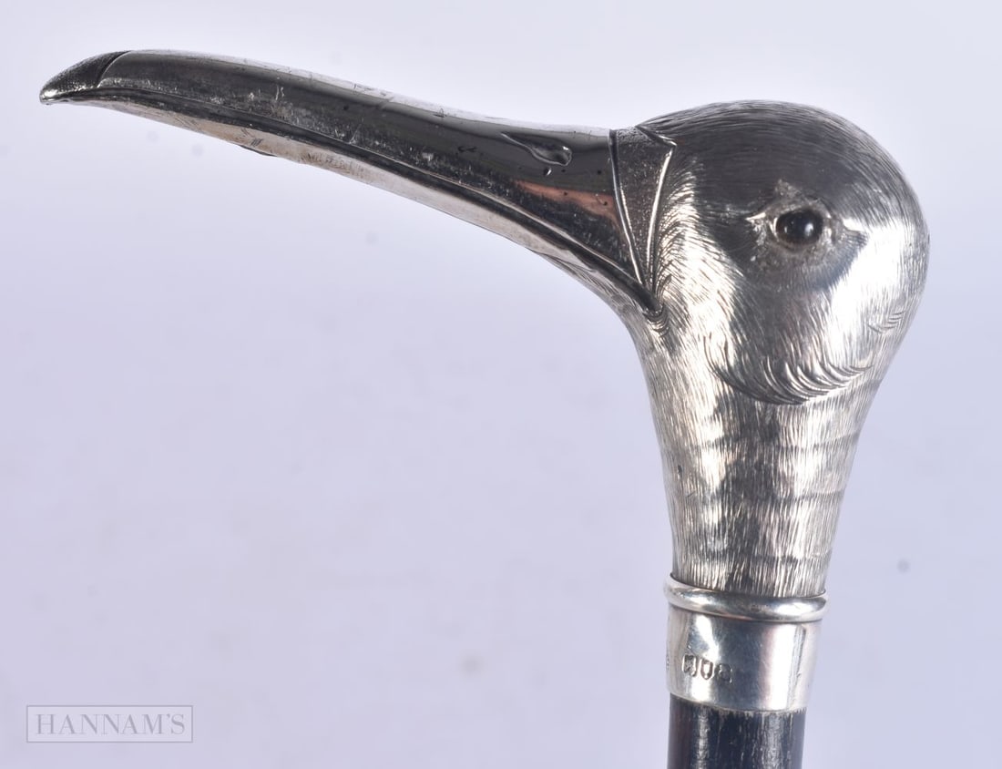 A VICTORIAN/EDWARDIAN SILVER SNIPE HEAD WALKING CANE with orange glass eyes. 86 cm long. (1 of 5)