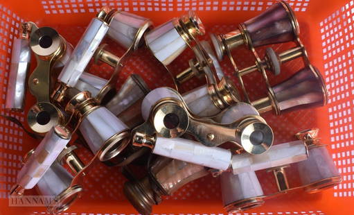 EIGHT PAIRS OF MOTHER OF PEARL OPERA GLASSES. Largest 18 cm wide extended. (8): EIGHT PAIRS OF MOTHER OF PEARL OPERA GLASSES. Largest 18 cm wide extended. (8)
