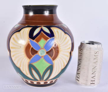 AN EARLY 20TH CENTURY DUTCH ART POTTERY BULBOUS VASE decorated with flowers. 22 cm x 15 cm.: AN EARLY 20TH CENTURY DUTCH ART POTTERY BULBOUS VASE decorated with flowers. 22 cm x 15 cm.