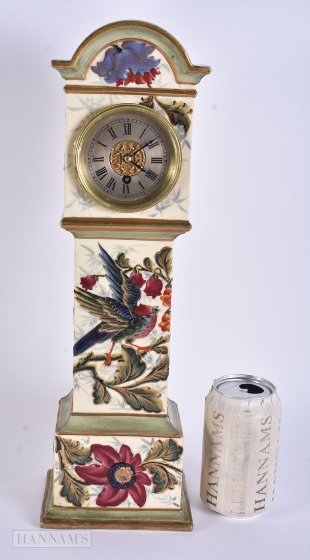 AN UNUSUAL 19TH CENTURY CONTINENTAL ARTS AND CRAFTS POTTERY CLOCK Zsolnay pecs style, painted and mo: AN UNUSUAL 19TH CENTURY CONTINENTAL ARTS AND CRAFTS POTTERY CLOCK Zsolnay pecs style, painted and moulded with birds. 40 cm high.