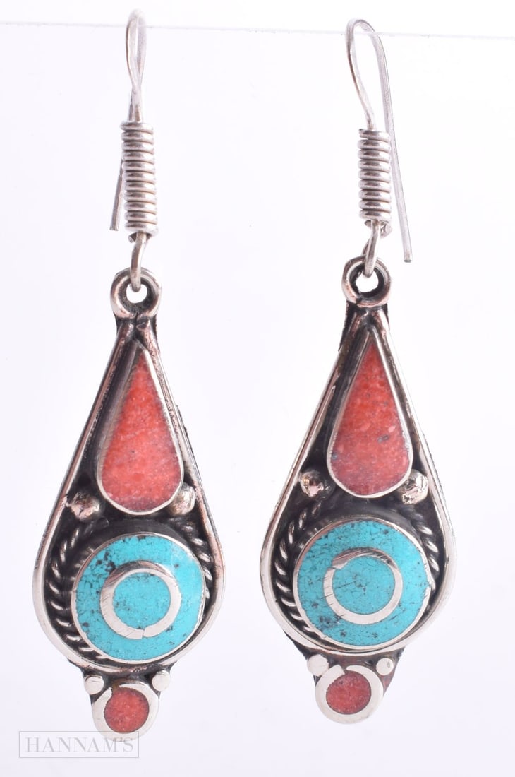 A PAIR OF TIBETAN CORAL AND TURQUOISE EARRINGS. 22 grams. 6.25 cm drop.: A PAIR OF TIBETAN CORAL AND TURQUOISE EARRINGS. 22 grams. 6.25 cm drop.
