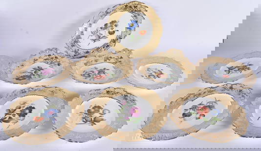 A SET OF EIGHT 19TH CENTURY ENGLISH PORCELAIN PLATES painted with flowers. 22 cm wide. (8): A SET OF EIGHT 19TH CENTURY ENGLISH PORCELAIN PLATES painted with flowers. 22 cm wide. (8)