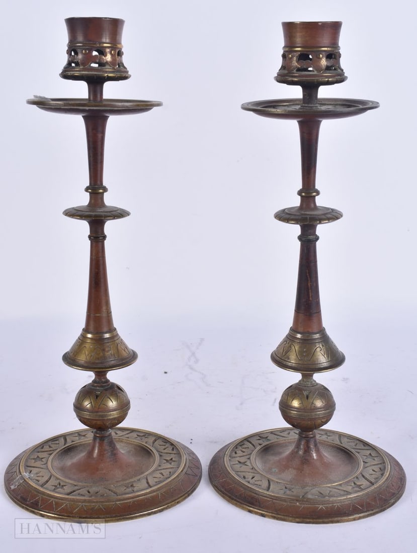 A PAIR OF ANTIQUE AESTHETIC MOVEMENT CANDLESTICKS. 24 cm high. (1 of 6)