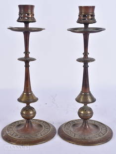 A PAIR OF ANTIQUE AESTHETIC MOVEMENT CANDLESTICKS. 24 cm high.: A PAIR OF ANTIQUE AESTHETIC MOVEMENT CANDLESTICKS. 24 cm high.