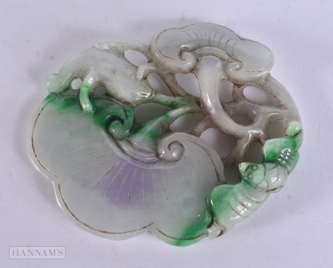 A CHINESE JADEITE PLAQUE. 99 grams. 8.5 cm x 7 cm. (1 of 4)