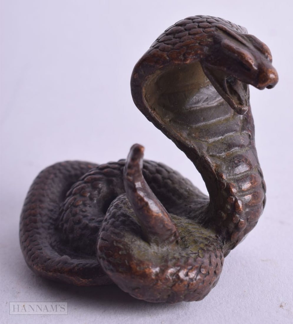 A JAPANESE BRONZE SNAKE. 88.5 grams. 4 cm x 4 cm.: A JAPANESE BRONZE SNAKE. 88.5 grams. 4 cm x 4 cm.