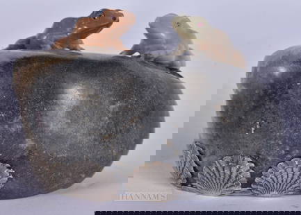 AN UNUSUAL CHINESE CARVED SOAPSTONE FROG BOULDER mounted in Continental silver. 963 grams. 11.25 cm: AN UNUSUAL CHINESE CARVED SOAPSTONE FROG BOULDER mounted in Continental silver. 963 grams. 11.25 cm x 7.5 cm.