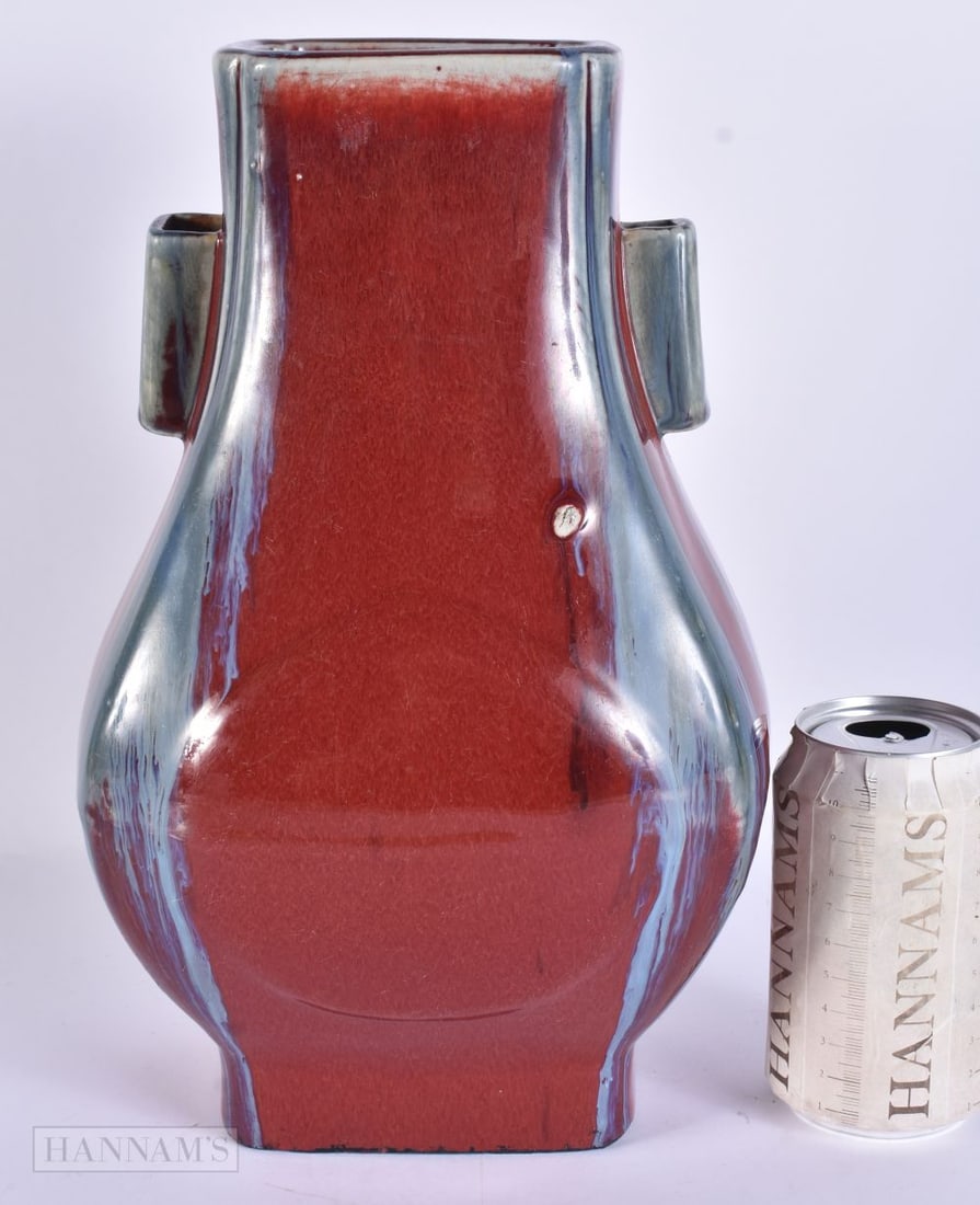 A CHINESE QING DYNASTY FLAMBE GLAZED VASE. 30 cm high. (1 of 6)