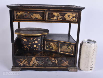 A FINE 19TH CENTURY JAPANESE MEIJI PERIOD BLACK AND GOLD LACQUER CABINET decorated in relief with bi: A FINE 19TH CENTURY JAPANESE MEIJI PERIOD BLACK AND GOLD LACQUER CABINET decorated in relief with birds. 24 cm x 26 cm x 18 cm.