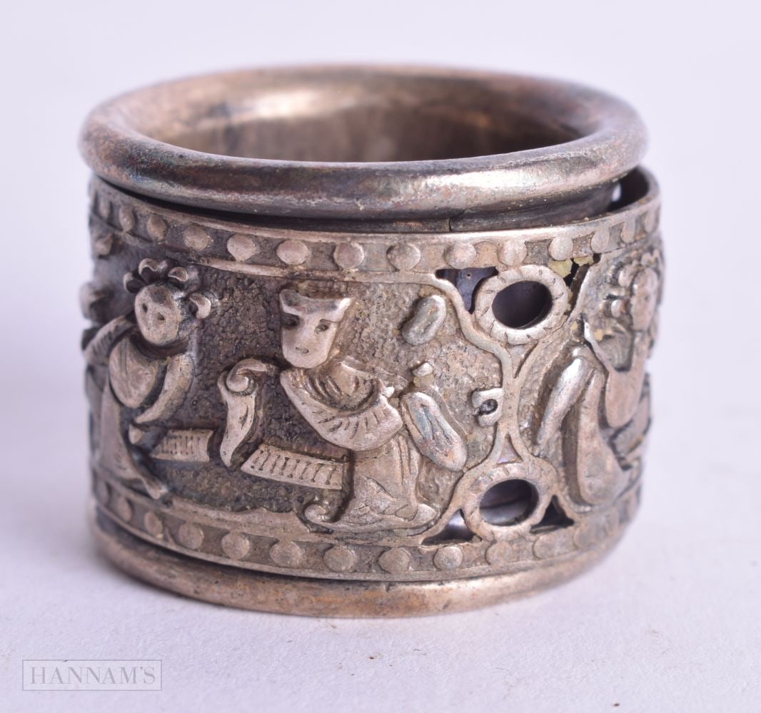 A CHINESE WHITE METAL ARCHERS RING. 3.5 grams. Y.: A CHINESE WHITE METAL ARCHERS RING. 3.5 grams. Y.