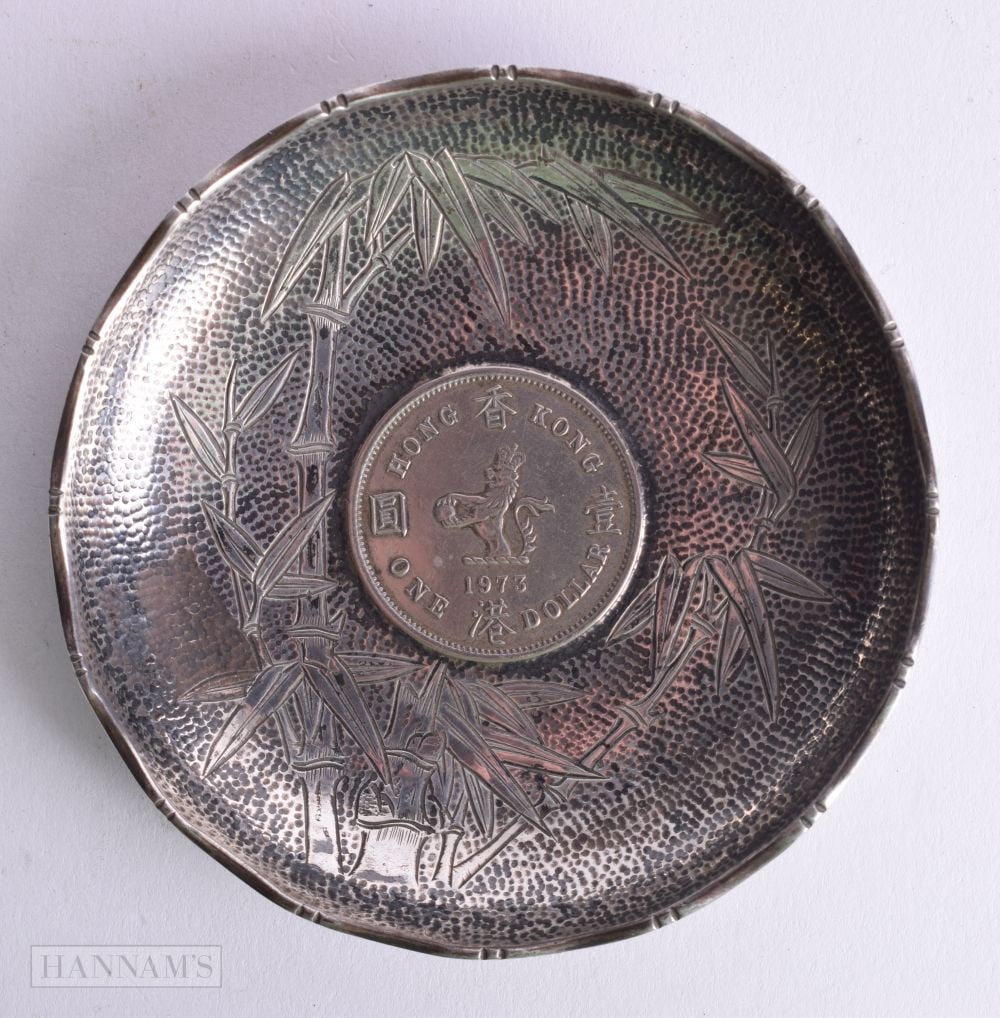 A CHINESE EXPORT SILVER COIN DISH. 44.2 grams. 8.5 cm wide. (1 of 3)