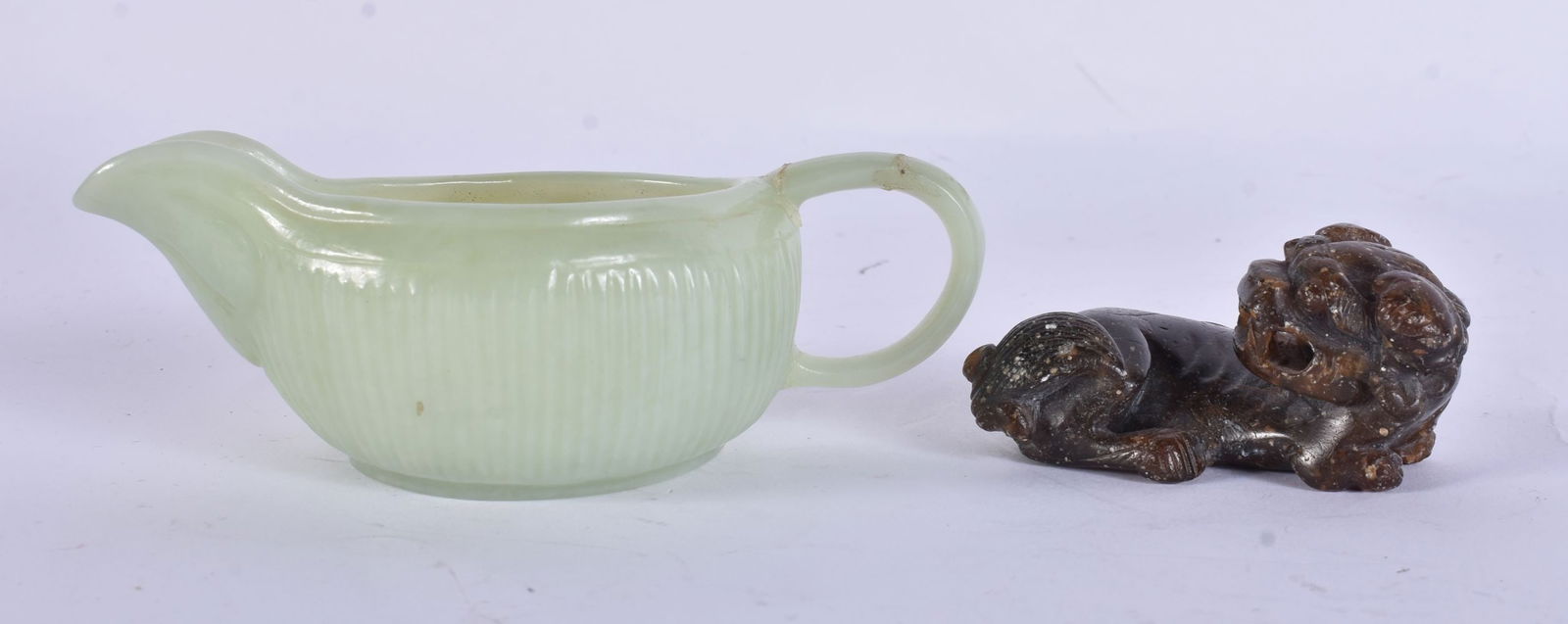 AN EARLY 20TH CENTURY CHINESE CARVED JADE SHALLOW JUG Late Qing/Republic, together with a carved sto (1 of 10)