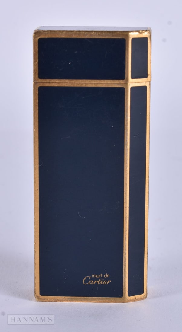 A CARTIER LIGHTER. 6.5 cm x 3.25cm.: A CARTIER LIGHTER. 6.5 cm x 3.25cm.