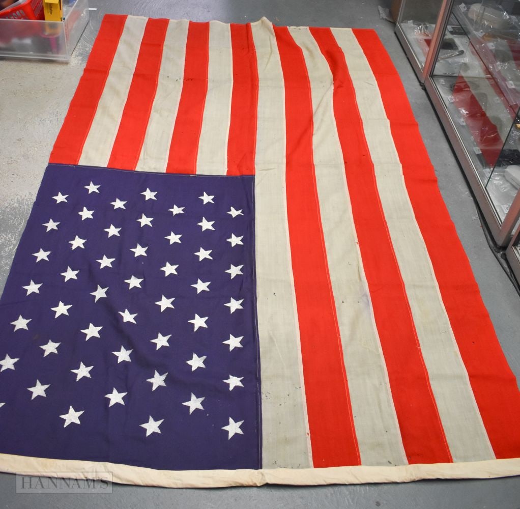 A VINTAGE AMERICAN FLAG. 225 cm x 140 cm. (1 of 4)