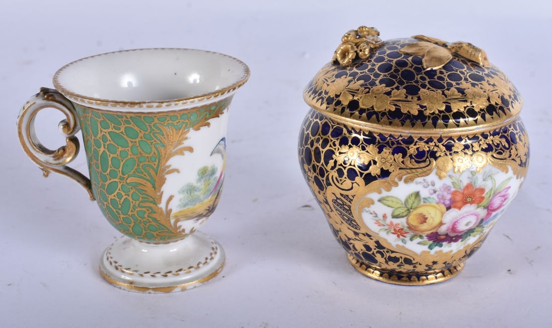 Late 18th century Sevres sorbet or ice cup painted with a bird in landscape on a sage green ground,: Late 18th century Sevres sorbet or ice cup painted with a bird in landscape on a sage green ground, and a small sucrier and cover from a cabaret set, 7.5 cm high