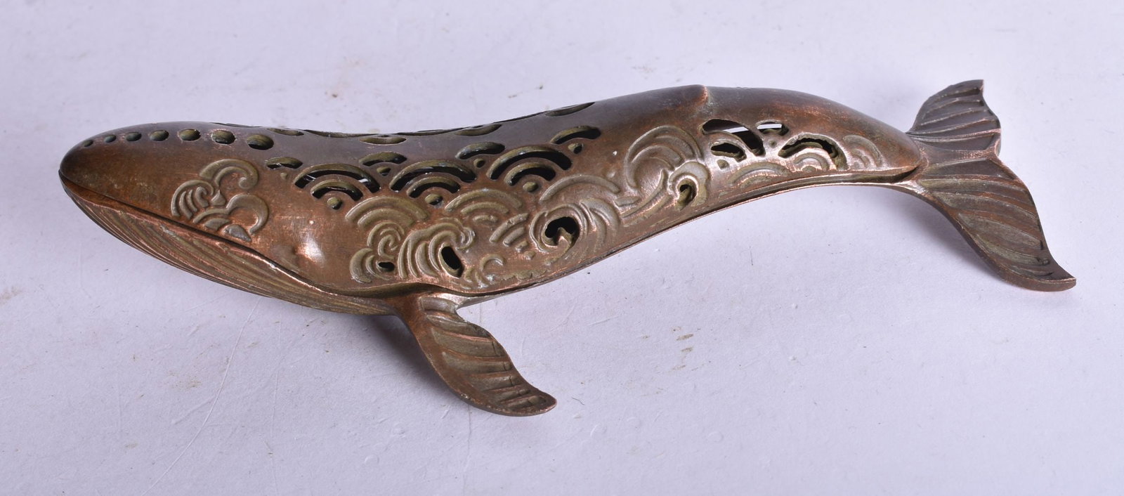 A JAPANESE BRONZE WHALE CENSER AND COVER. 151 grams. 15.5 cm x 7.5 cm.: A JAPANESE BRONZE WHALE CENSER AND COVER. 151 grams. 15.5 cm x 7.5 cm.