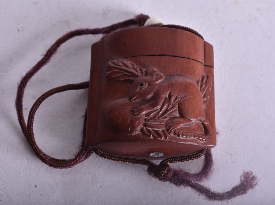 A JAPANESE WOODEN INRO. 22.2 grams. 4.5 cm x 4.25 cm.: A JAPANESE WOODEN INRO. 22.2 grams. 4.5 cm x 4.25 cm.