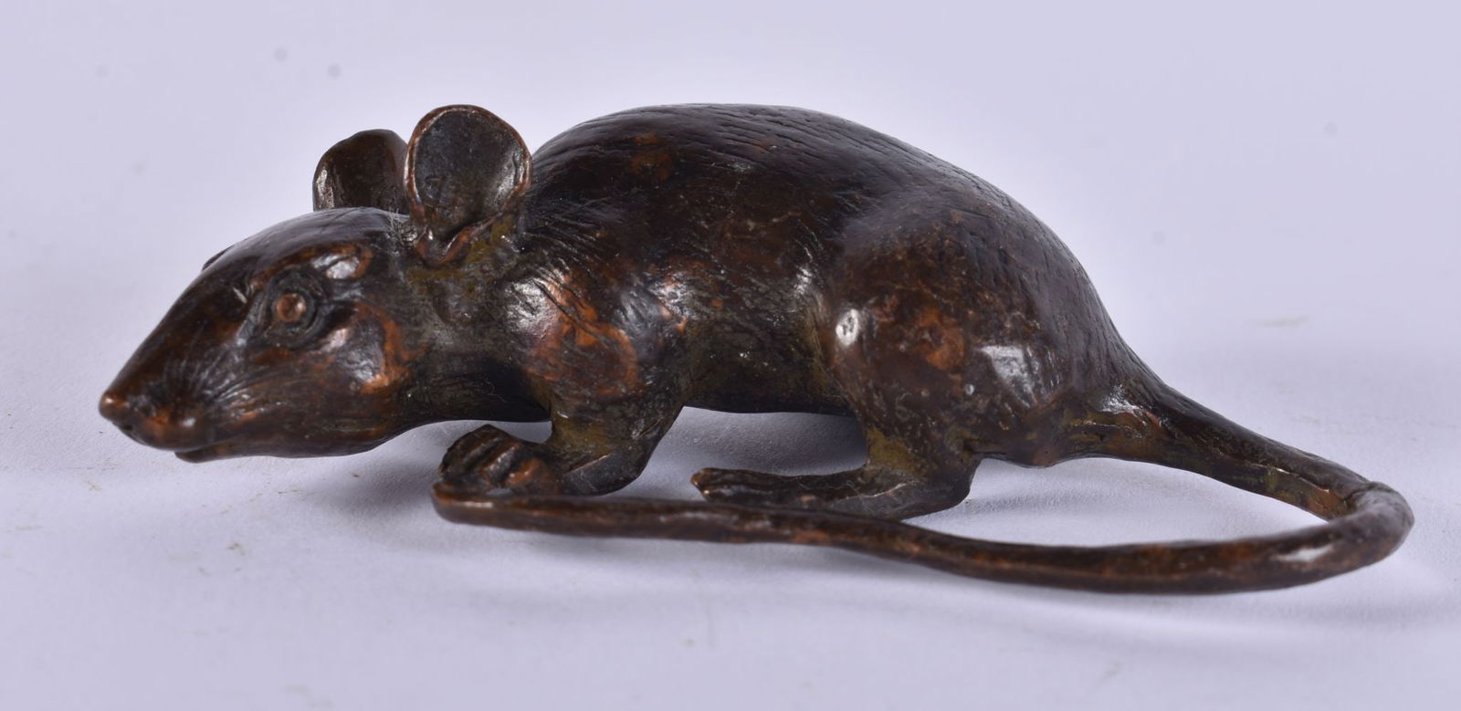 A JAPANESE BRONZE RAT. 167 grams. 8.5 cm x 4.5 cm.: A JAPANESE BRONZE RAT. 167 grams. 8.5 cm x 4.5 cm.