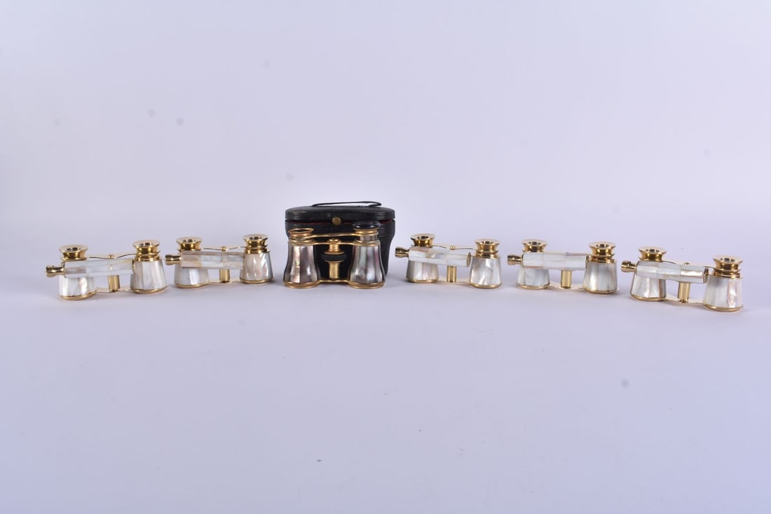 SIX PAIRS OF MOTHER OF PEARL OPERA GLASSES. Largest 18 cm wide extended. (6): SIX PAIRS OF MOTHER OF PEARL OPERA GLASSES. Largest 18 cm wide extended. (6)
