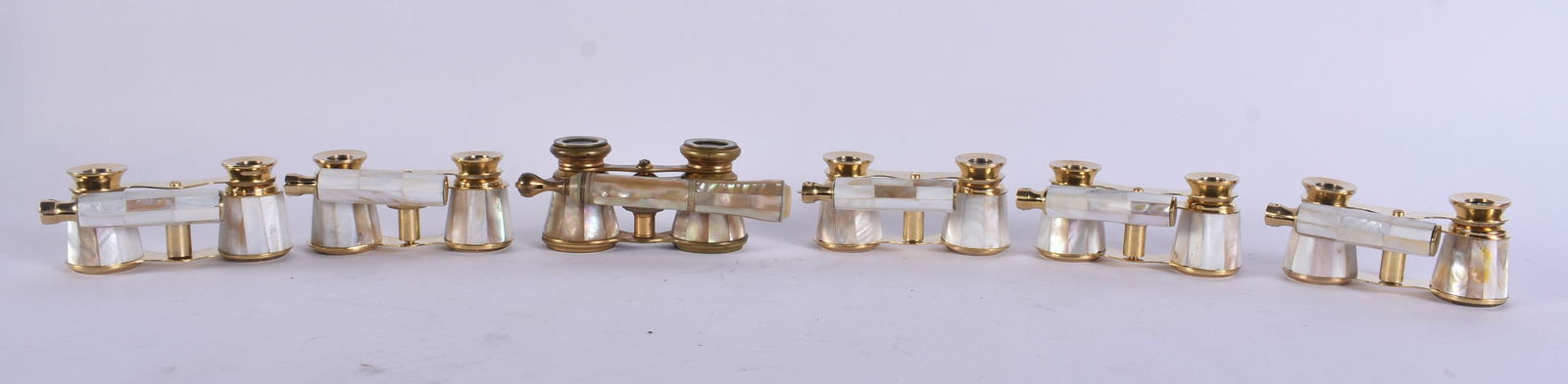 SIX PAIRS OF MOTHER OF PEARL OPERA GLASSES. Largest 18 cm wide extended. (6): SIX PAIRS OF MOTHER OF PEARL OPERA GLASSES. Largest 18 cm wide extended. (6)