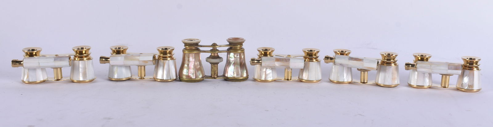 SIX PAIRS OF MOTHER OF PEARL OPERA GLASSES. Largest 18 cm wide extended. (6): SIX PAIRS OF MOTHER OF PEARL OPERA GLASSES. Largest 18 cm wide extended. (6)