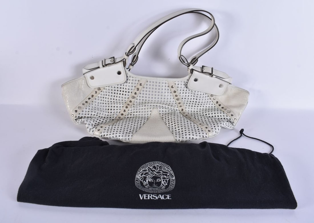 A GIANNI VERSACE WHITE LEATHER HALF CIRCULAR SHOULDER BAG. 26 cm wide.: A GIANNI VERSACE WHITE LEATHER HALF CIRCULAR SHOULDER BAG. 26 cm wide.