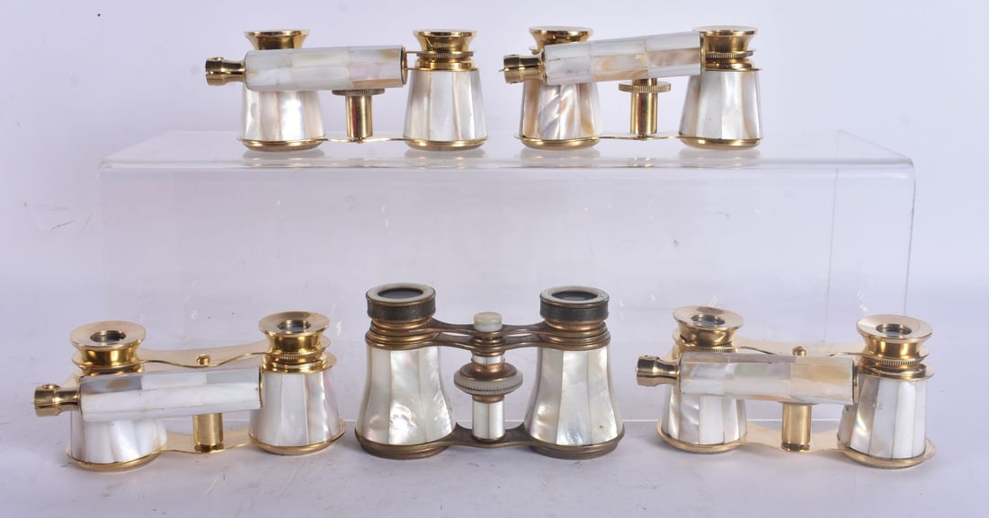 FIVE PAIRS OF MOTHER OF PEARL OPERA GLASSES. Largest 18 cm wide. (5): FIVE PAIRS OF MOTHER OF PEARL OPERA GLASSES. Largest 18 cm wide. (5)
