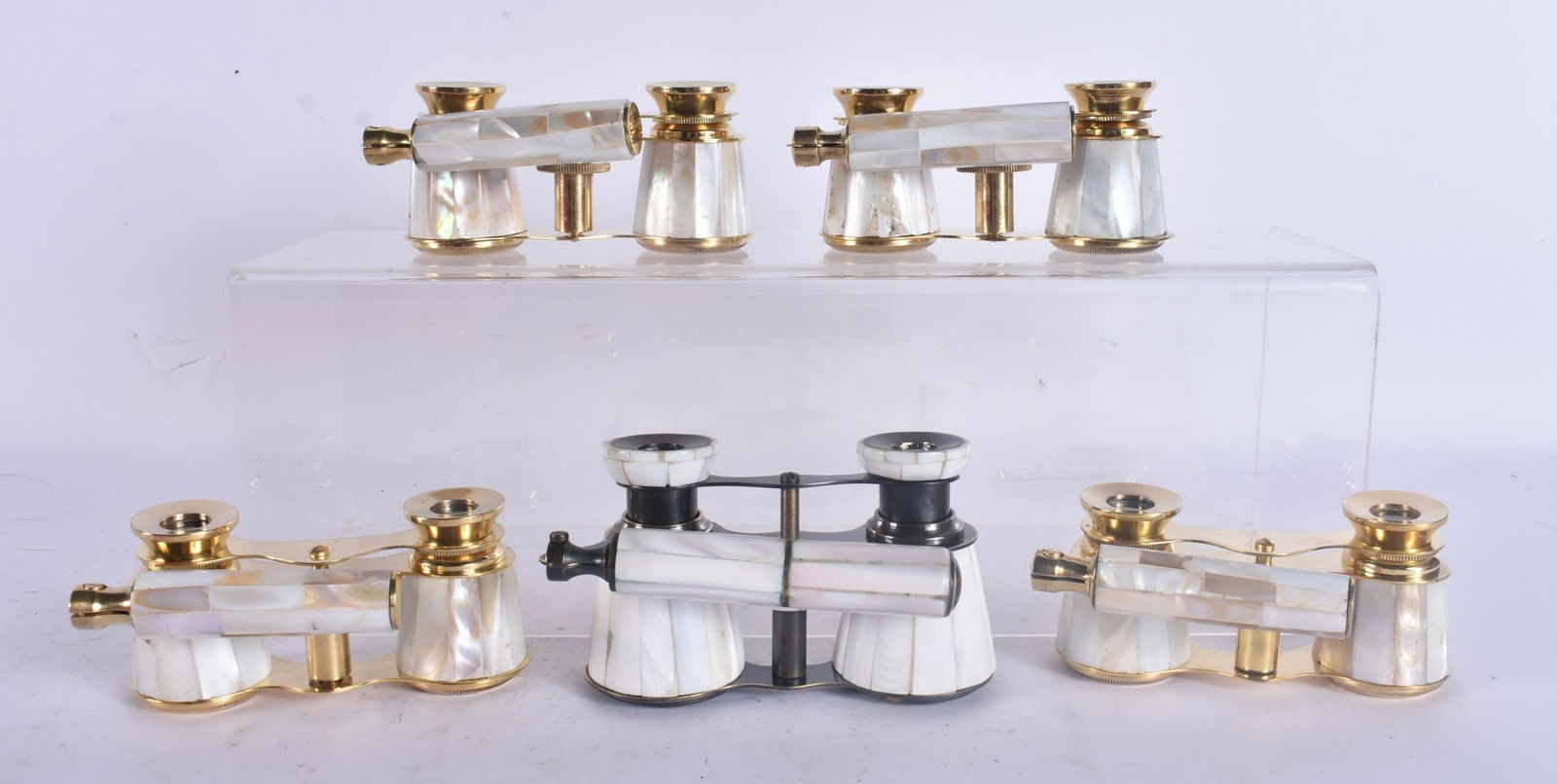 FIVE PAIRS OF MOTHER OF PEARL OPERA GLASSES. Largest 18 cm wide. (5) (1 of 1)