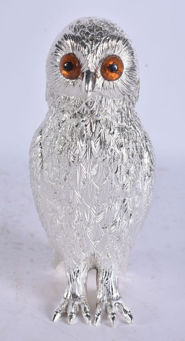 A SILVER PLATED OWL PEPPER POT. 15cm high. (1 of 4)