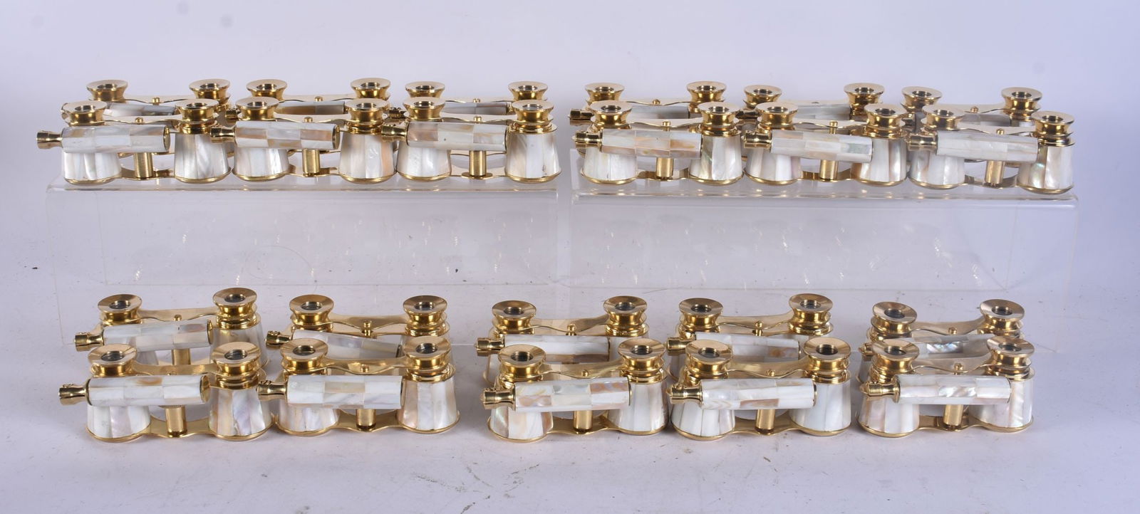 TWENTY PAIRS OF MOTHER OF PEARL OPERA GLASSES. 18 cm long extended. (20): TWENTY PAIRS OF MOTHER OF PEARL OPERA GLASSES. 18 cm long extended. (20)