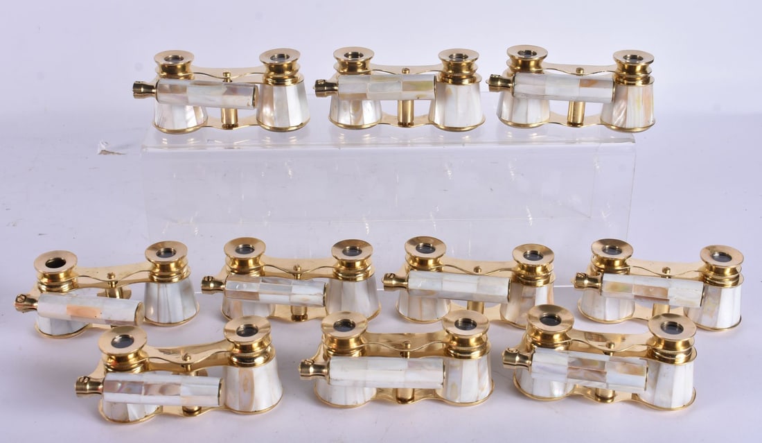 TEN PAIRS OF MOTHER OF PEARL OPERA GLASSES. 18 cm wide extended. (10): TEN PAIRS OF MOTHER OF PEARL OPERA GLASSES. 18 cm wide extended. (10)