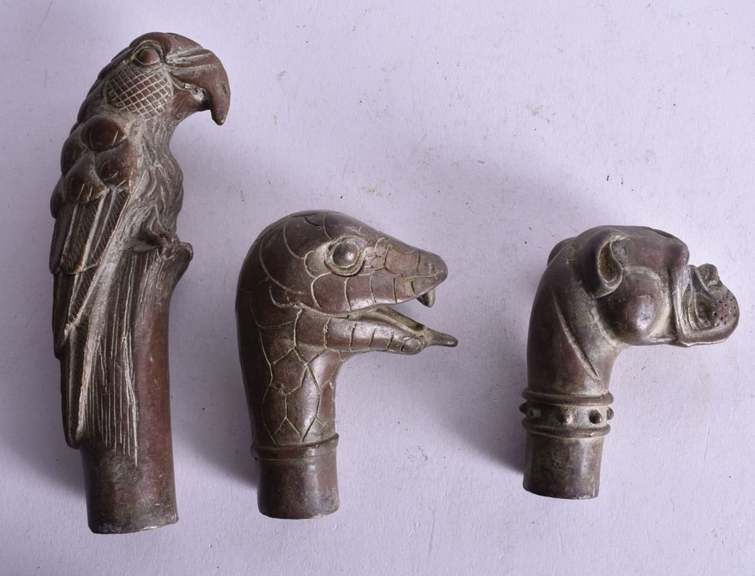 THREE CHINESE BRONZE WALKING CANE HANDLES. 453 grams. 12.75 cm long. (3) (1 of 3)