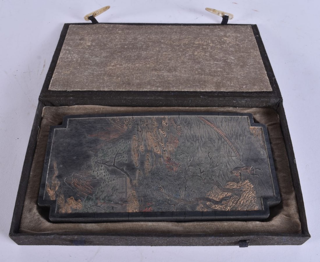 A CASED CHINESE INK CAKE. 24 cm x 10 cm.: A CASED CHINESE INK CAKE. 24 cm x 10 cm.