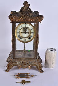 AN ANTIQUE AMERICAN ANSONIA CLOCK COMPANY REGULATOR MANTEL CLOCK. 38 cm x 18 cm.: AN ANTIQUE AMERICAN ANSONIA CLOCK COMPANY REGULATOR MANTEL CLOCK. 38 cm x 18 cm.