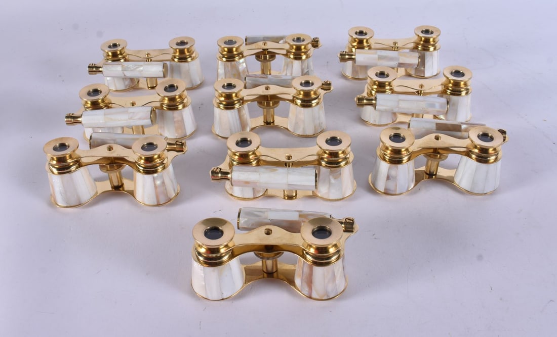 TEN PAIRS OF MOTHER OF PEARL OPERA GLASSES. 18 cm long extended. (10): TEN PAIRS OF MOTHER OF PEARL OPERA GLASSES. 18 cm long extended. (10)