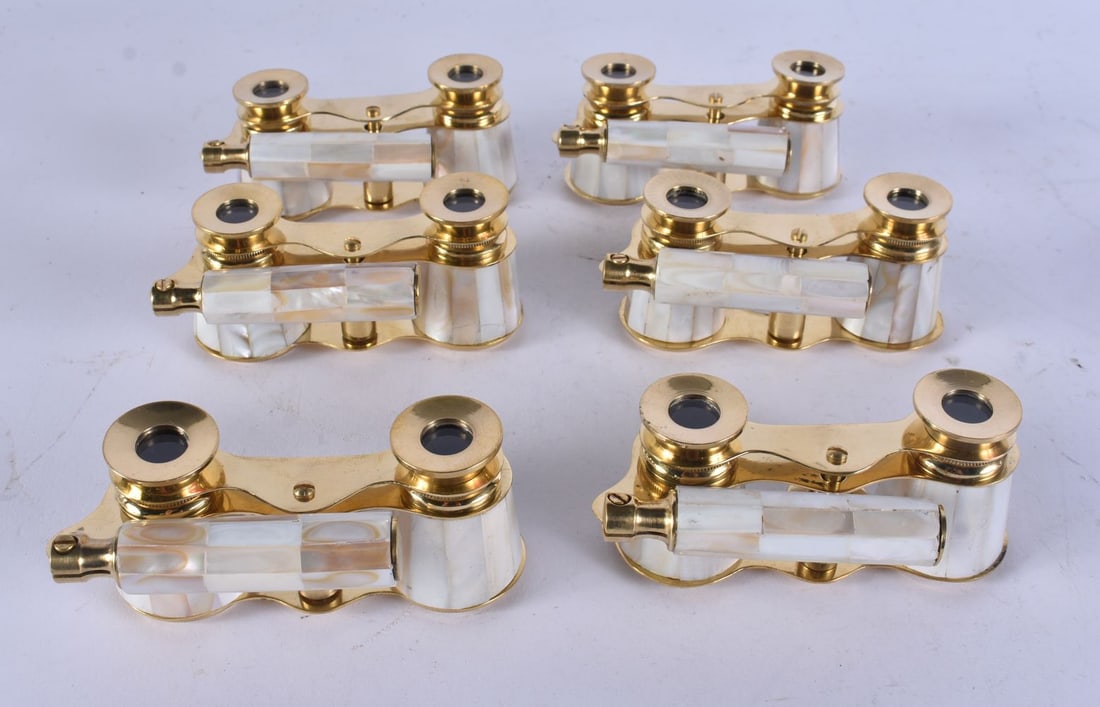 SIX PAIRS OF MOTHER OF PEARL OPERA GLASSES. 18 cm long extended. (6): SIX PAIRS OF MOTHER OF PEARL OPERA GLASSES. 18 cm long extended. (6)