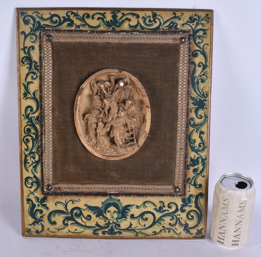 AN ANTIQUE ITALIAN RELIGIOUS PLASTER PLAQUE depicting the removal of Christ from the cross. 36 cm x: AN ANTIQUE ITALIAN RELIGIOUS PLASTER PLAQUE depicting the removal of Christ from the cross. 36 cm x 24 cm.