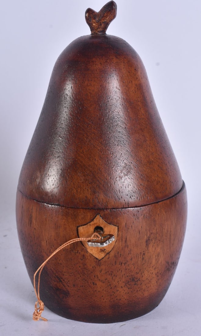 A CARVED WOOD PEAR TEA CADY. 15 cm high.: A CARVED WOOD PEAR TEA CADY. 15 cm high.