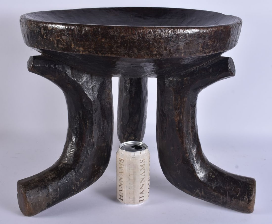 A LARGE ANTIQUE AFRICAN CARVED WOOD TRIBAL STOOL. 44 cm x 34 cm. (1 of 4)