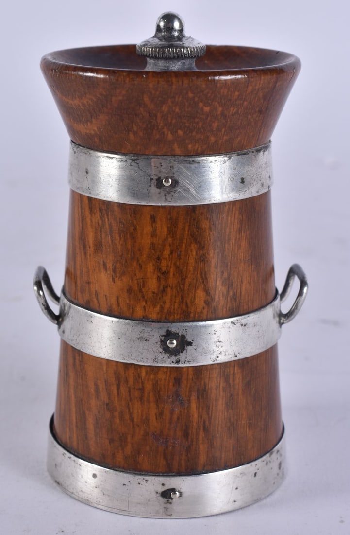 AN ANTIQUE SILVER MOUNTED BARREL FORM CONDIMENT. 9.5 cm high.: AN ANTIQUE SILVER MOUNTED BARREL FORM CONDIMENT. 9.5 cm high.