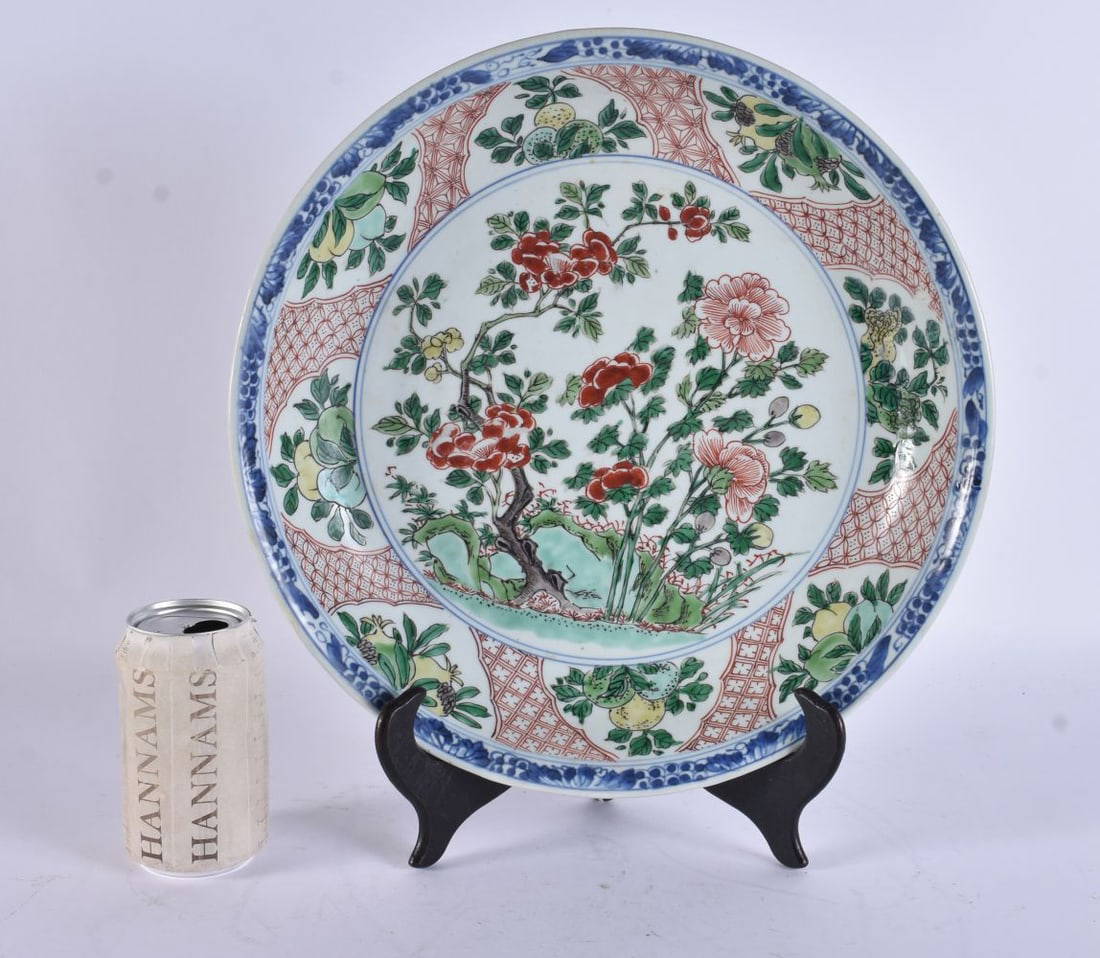 A 17TH CENTURY CHINESE WUCAI PORCELAIN DISH Kangxi, painted with floral sprays. 33 cm wide.
