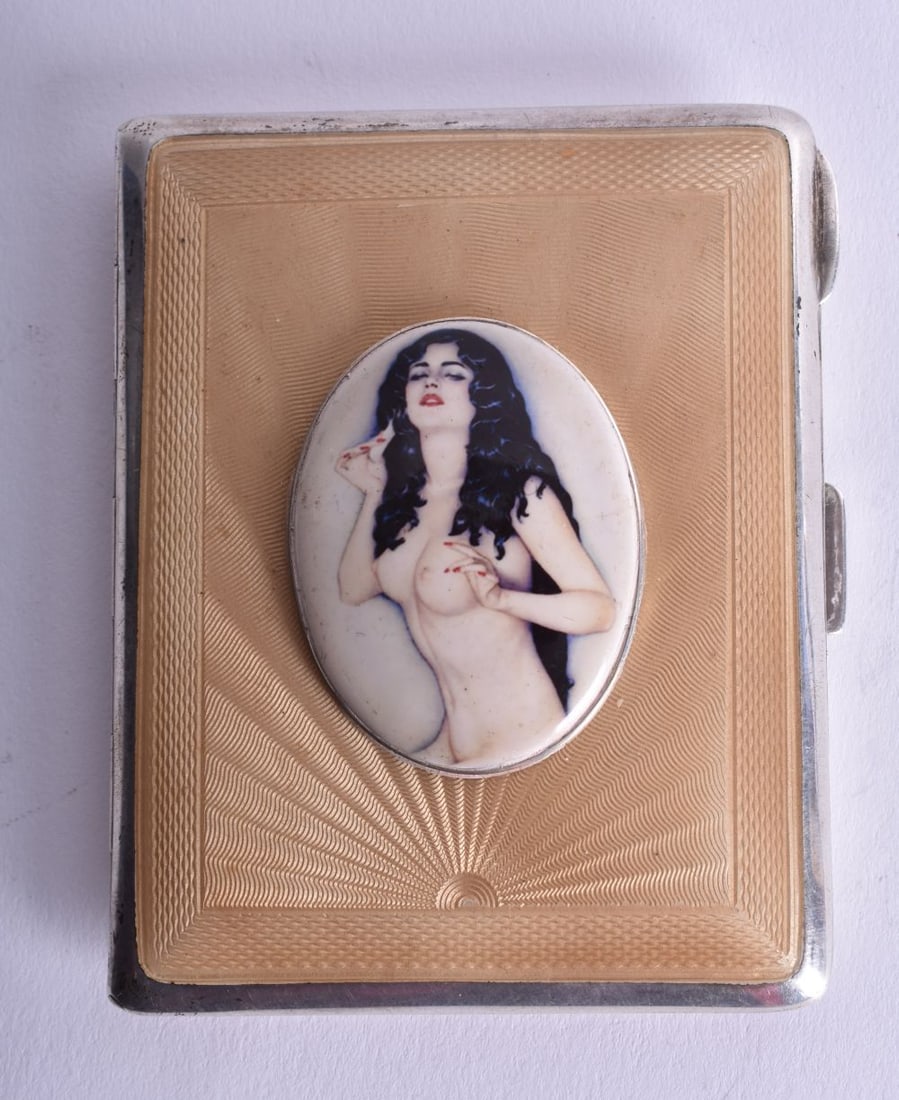 A Silver Cigarette Case with Guilloche Enamel Front and Nude Female Cabochon and Engine Turned Back: A Silver Cigarette Case with Guilloche Enamel Front and Nude Female Cabochon and Engine Turned Back. Hallmarked Birmingham 1947. 8.6cm x 6.8cm x 1.6cm, weight 115.8g