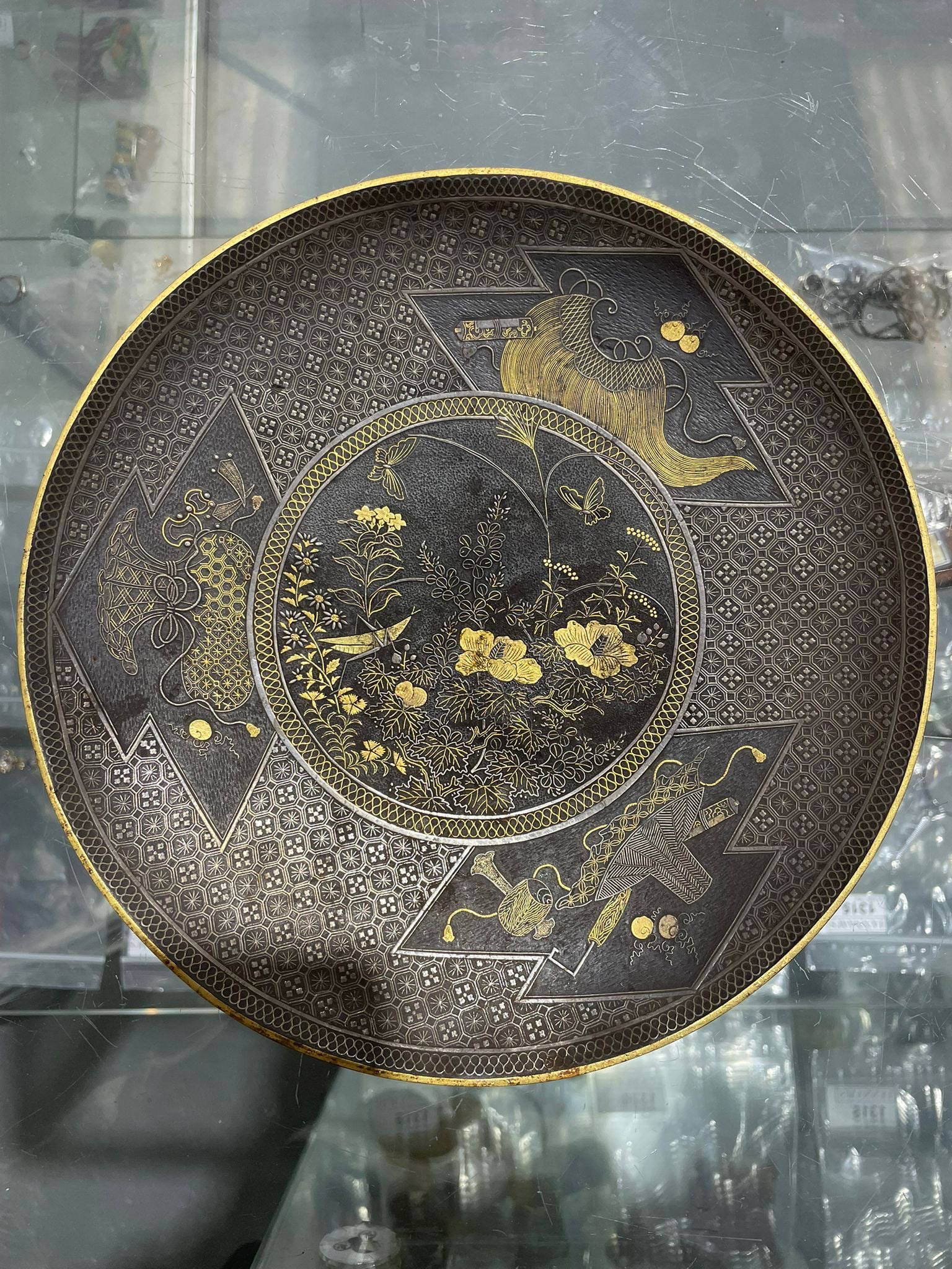 A LATE 19TH CENTURY JAPANESE MEIJI PERIOD KOMAI STYLE DAMASCENED IRON DISH decorated with insects, p