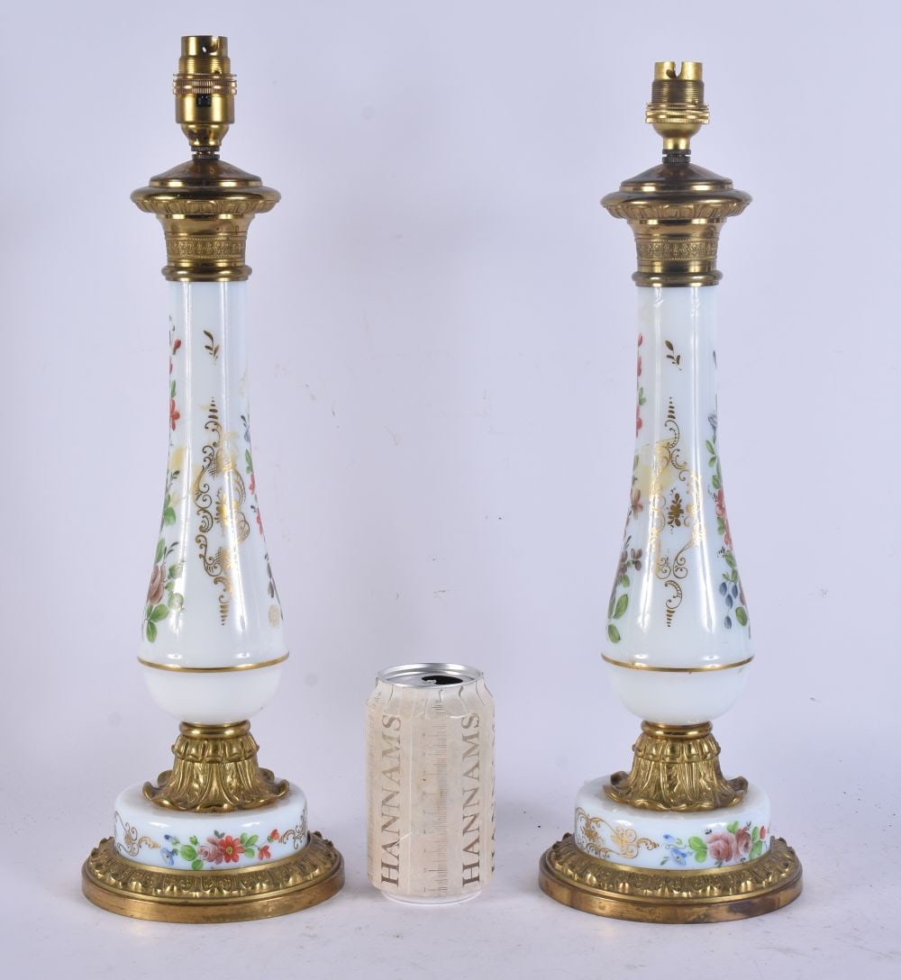 A PAIR OF ANTIQUE COUNTRY HOUSE OPALINE GLASS LAMPS. 43 cm high.: A PAIR OF ANTIQUE COUNTRY HOUSE OPALINE GLASS LAMPS. 43 cm high.