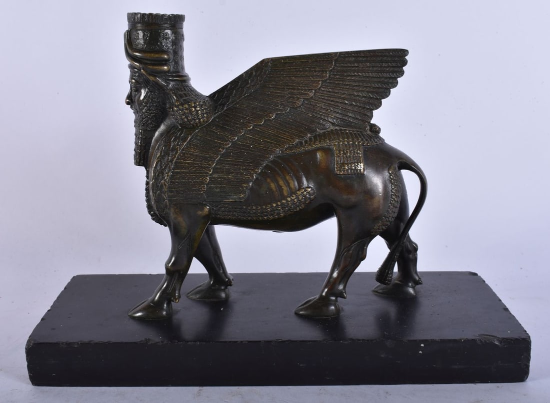 A FINE AND RARE 19TH CENTURY EUROPEAN GRAND TOUR BRONZE OF A WINGED MALE BEAST modelled upon a black (1 of 8)