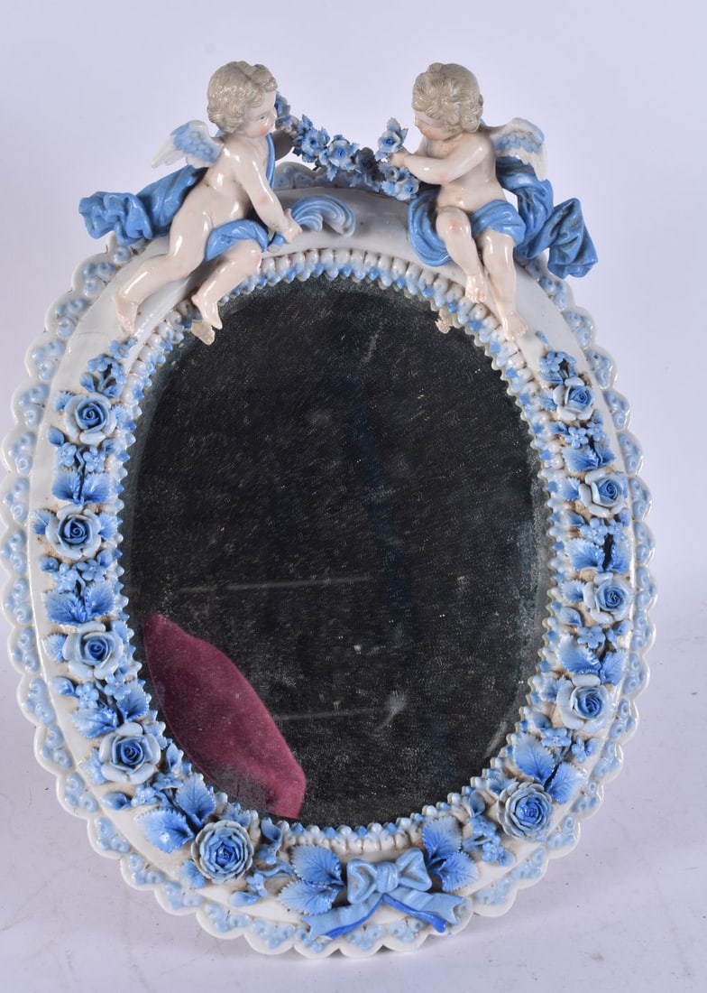 AN ANTIQUE GERMAN PORCELAIN ENCRUSTED MIRROR. 34 cm x 22 cm. (1 of 6)