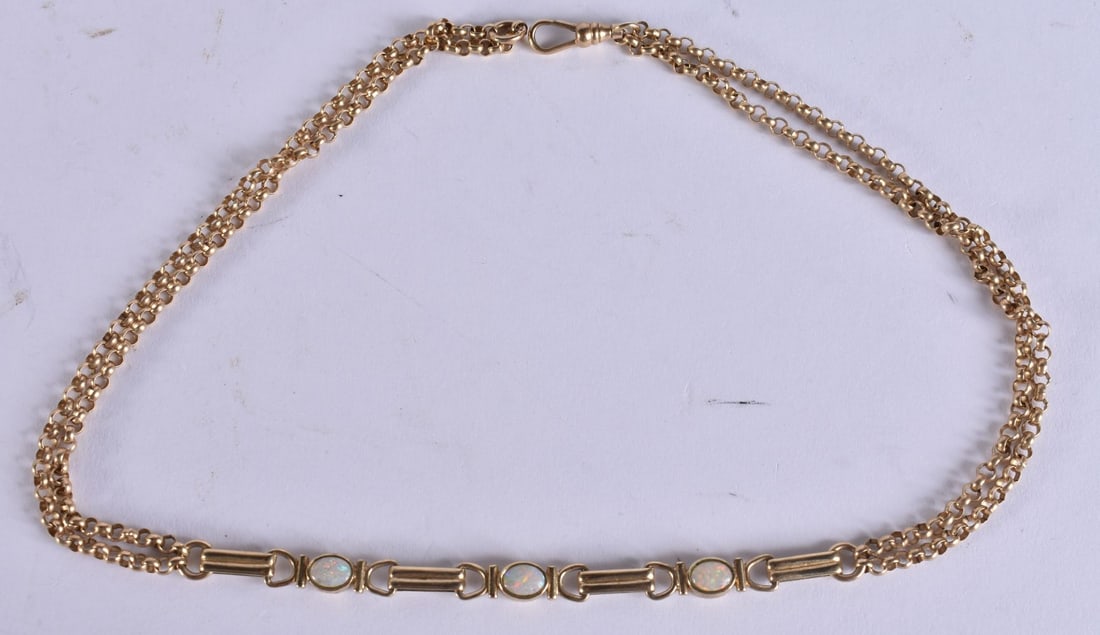 A 9CT GOLD AND OPAL NECKLACE. 18.8 grams. 42 cm long. (1 of 4)